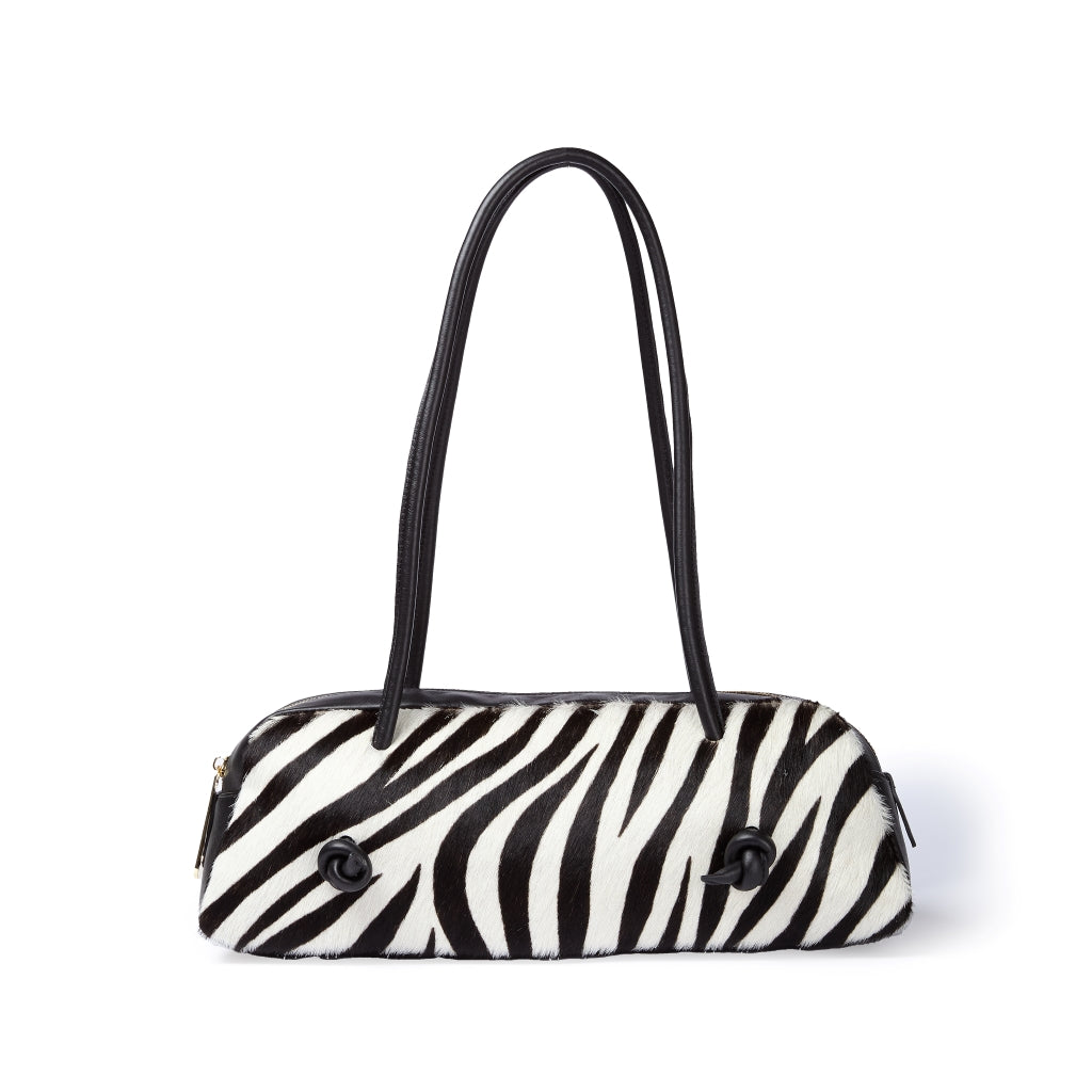 Grace pony borsa allungata in pelle di vitello stampa animalier con finiture in pelle liscia