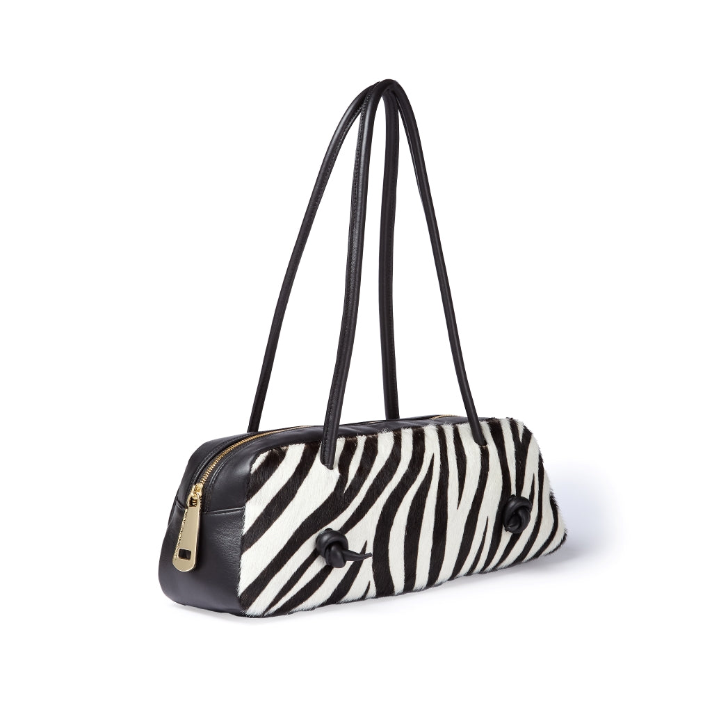 Grace pony borsa allungata in pelle di vitello stampa animalier con finiture in pelle liscia