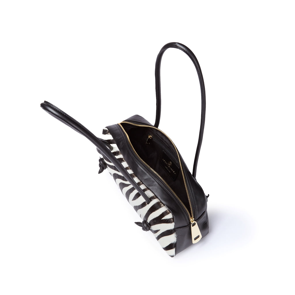 Grace pony borsa allungata in pelle di vitello stampa animalier con finiture in pelle liscia