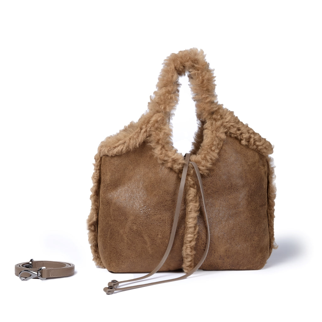 Grace woven elongated bag in braided calfskin