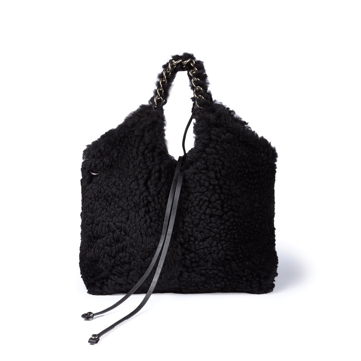 Grace woven elongated bag in braided calfskin