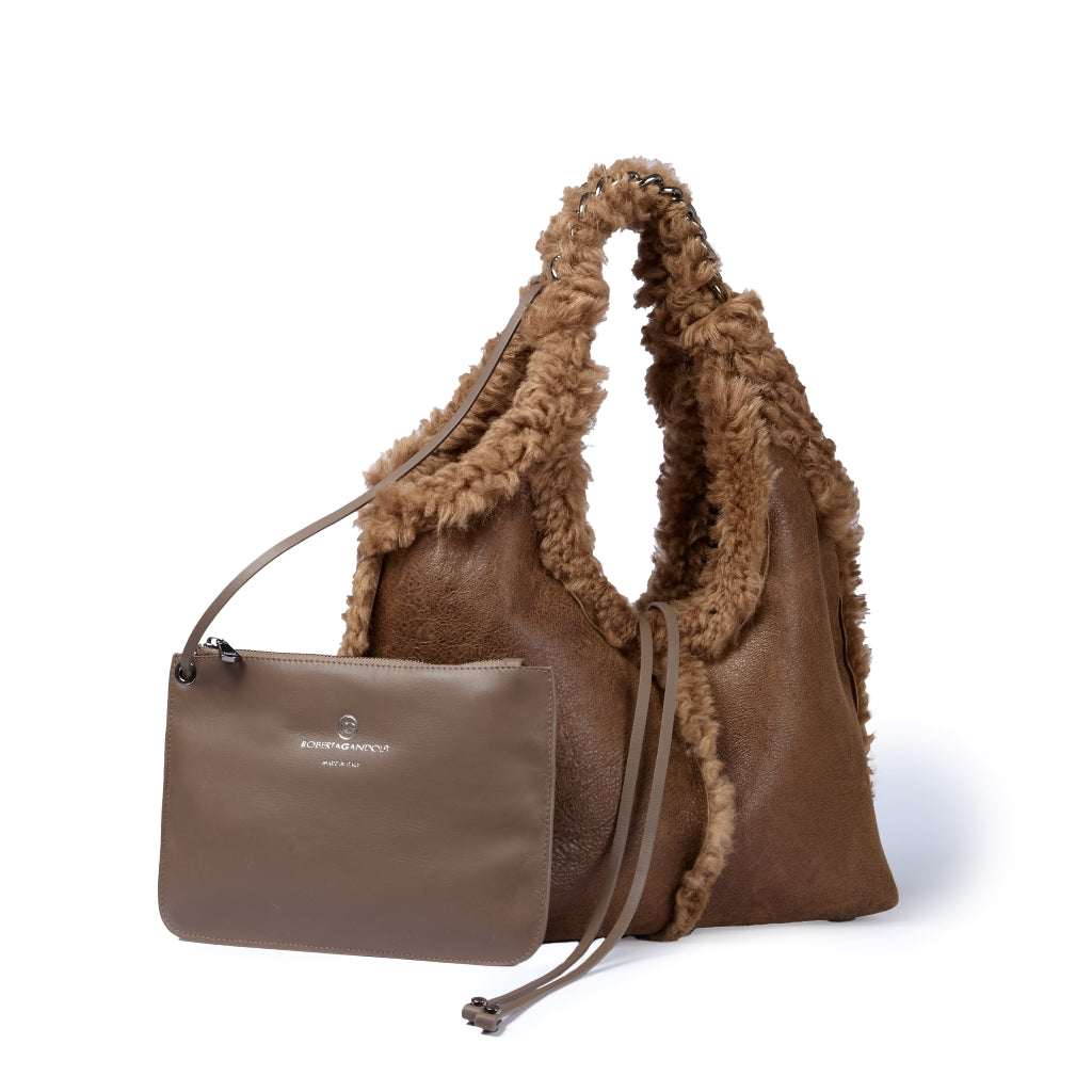 Grace woven elongated bag in braided calfskin