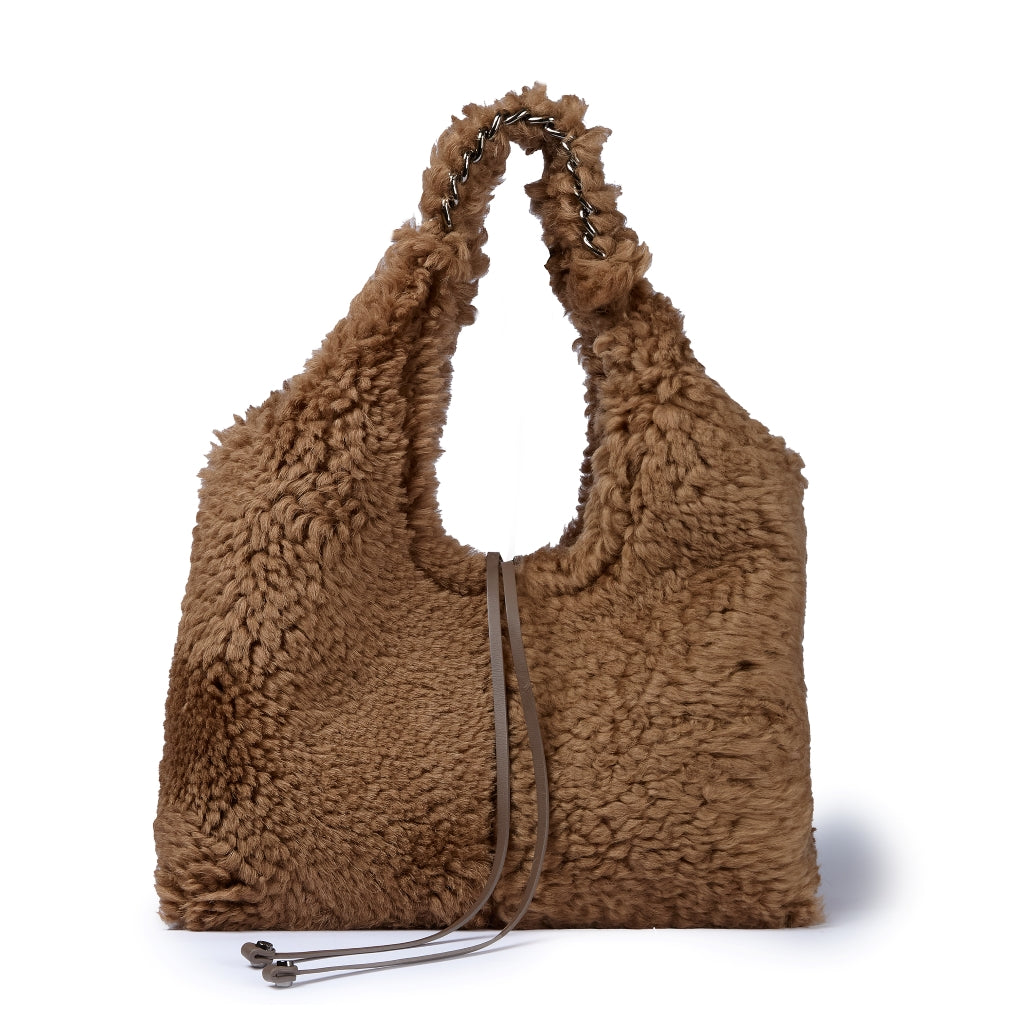 Grace woven elongated bag in braided calfskin