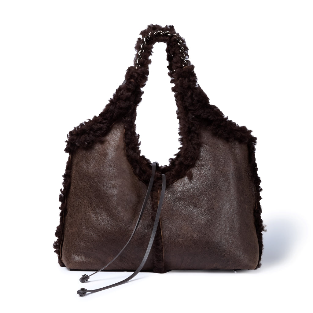 Grace woven elongated bag in braided calfskin