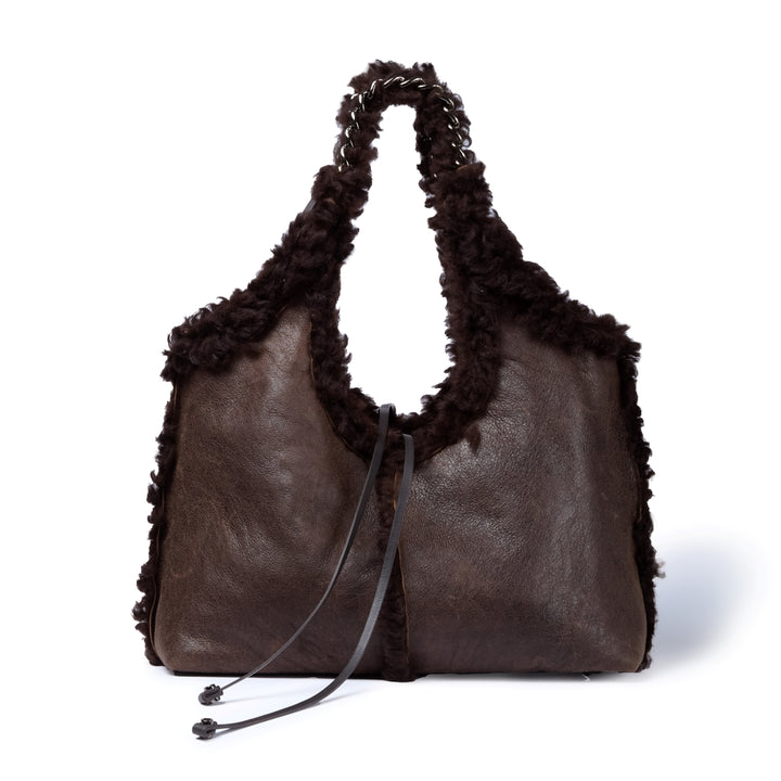 Grace woven elongated bag in braided calfskin