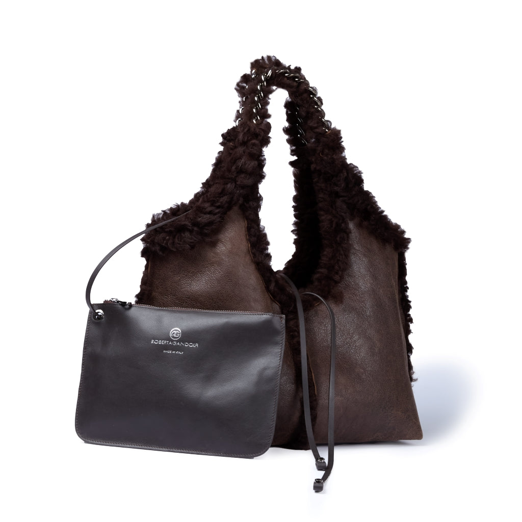 Grace woven elongated bag in braided calfskin