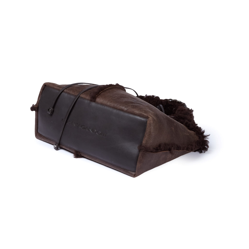 Grace woven elongated bag in braided calfskin