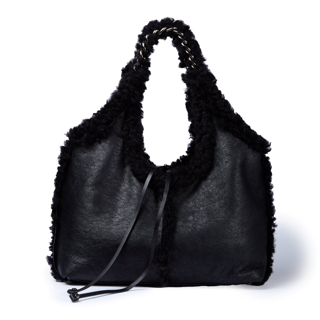 Grace woven elongated bag in braided calfskin