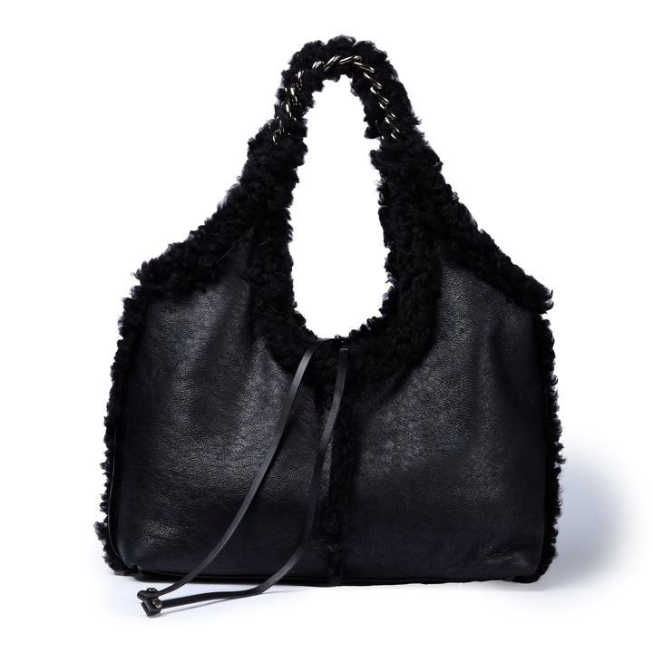 Grace woven elongated bag in braided calfskin