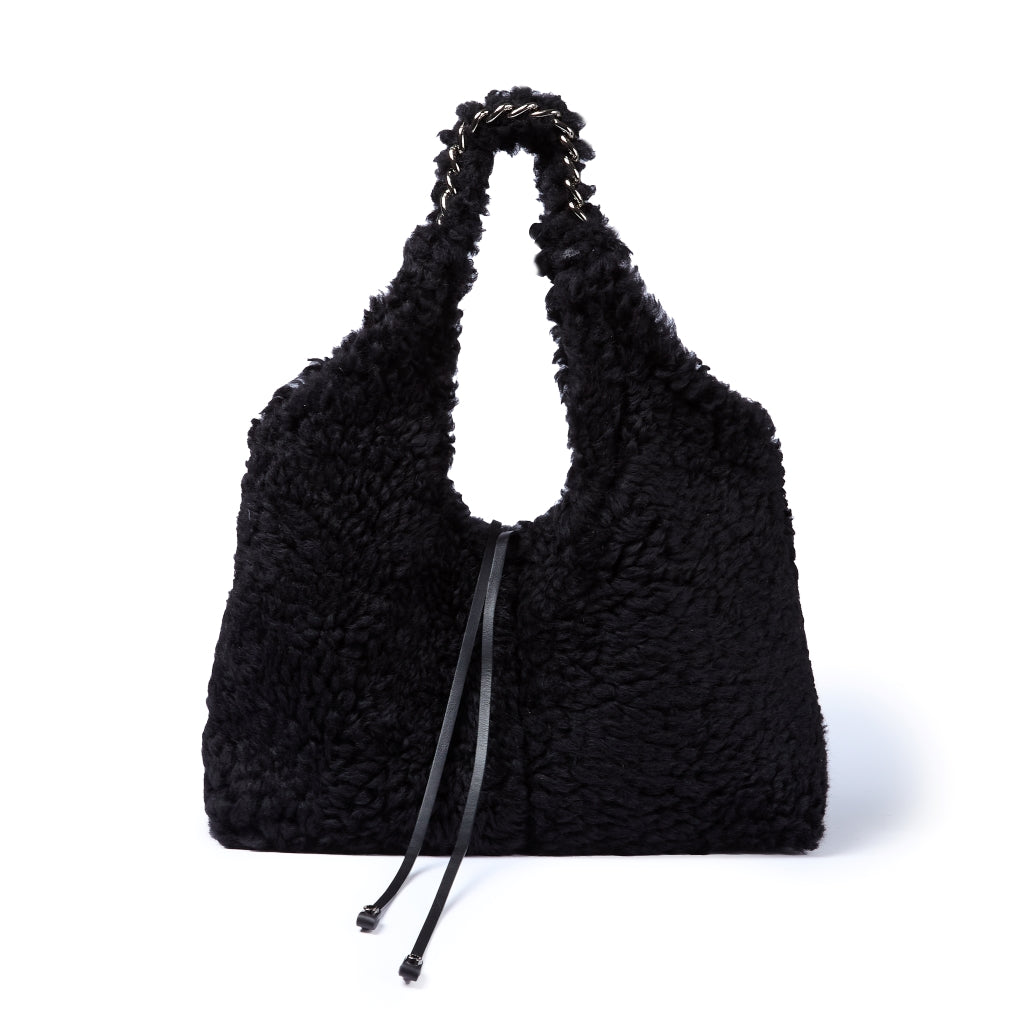 Grace woven elongated bag in braided calfskin