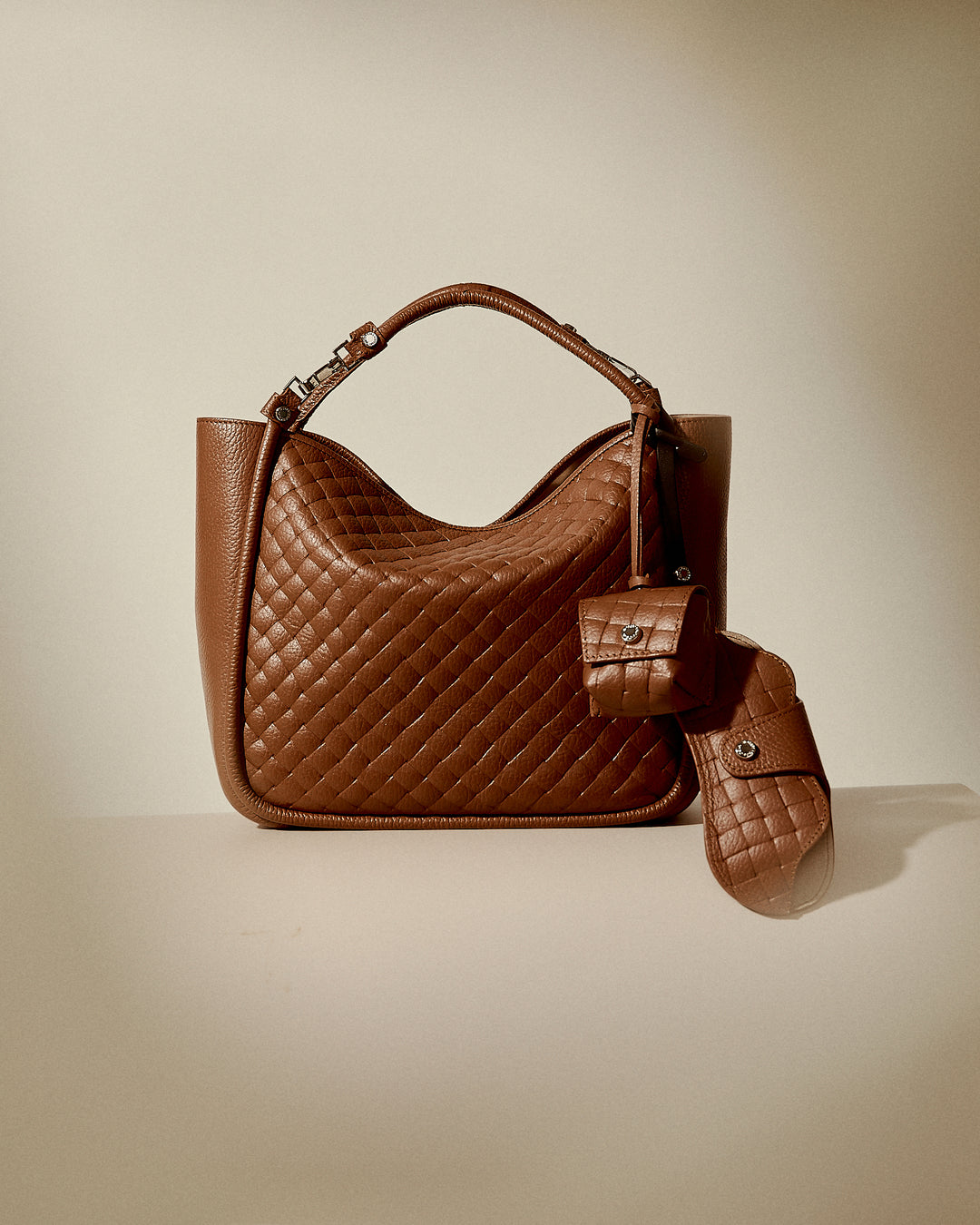 Woven charms glasses holder in braided printed leather