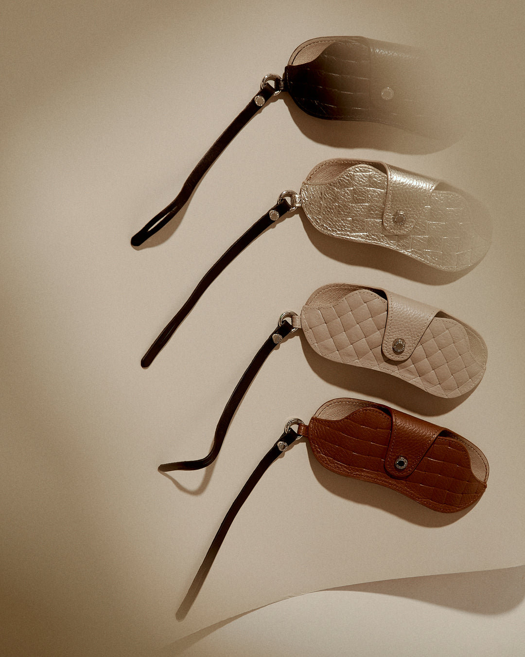 Woven charms glasses holder in braided printed leather