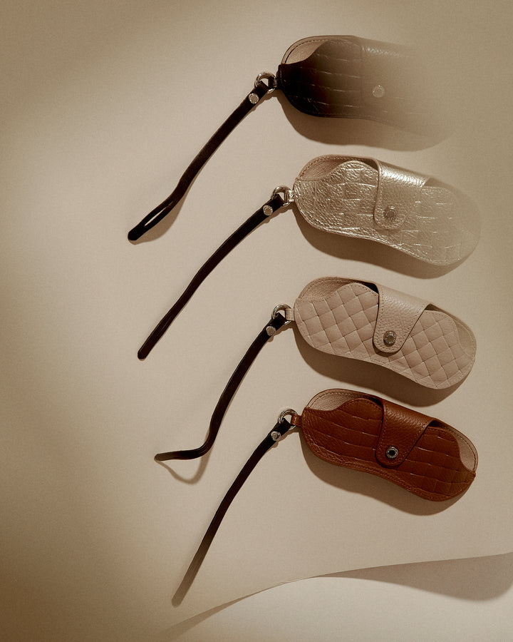 Woven charms glasses holder in braided printed leather