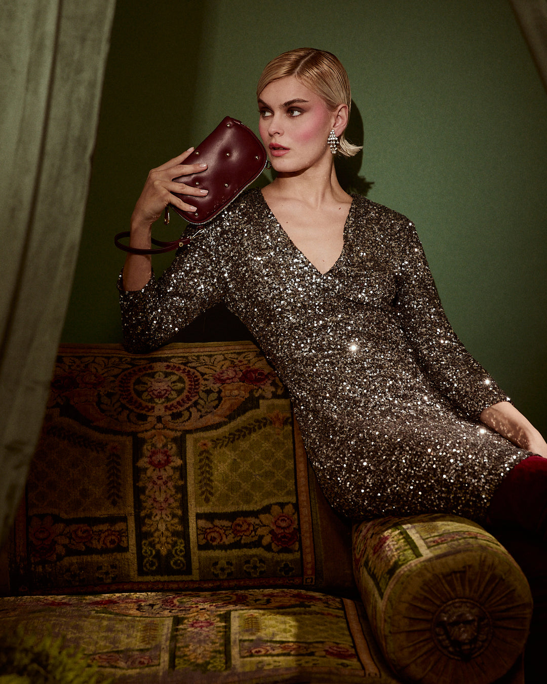 Marika purse in soft nappa with chain shoulder strap and leather sleeve