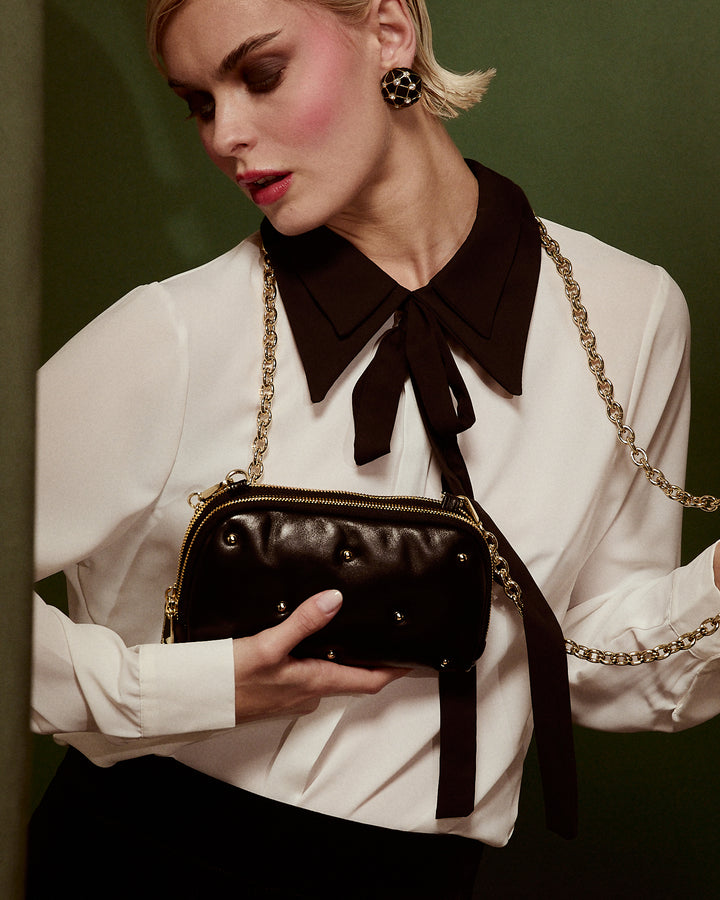 Marika purse in soft nappa with chain shoulder strap and leather sleeve