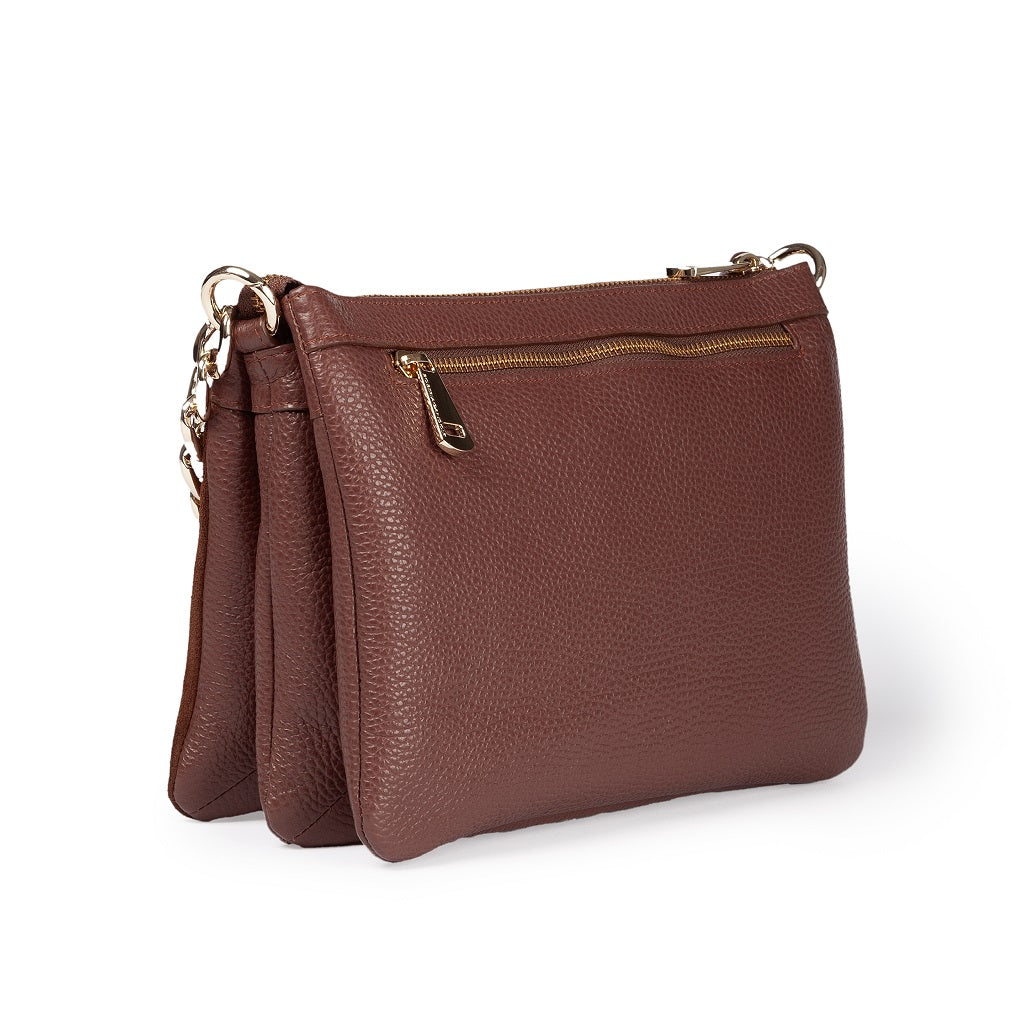 Amina small leather handbag with wrapped tubular handle and detachable shoulder strap