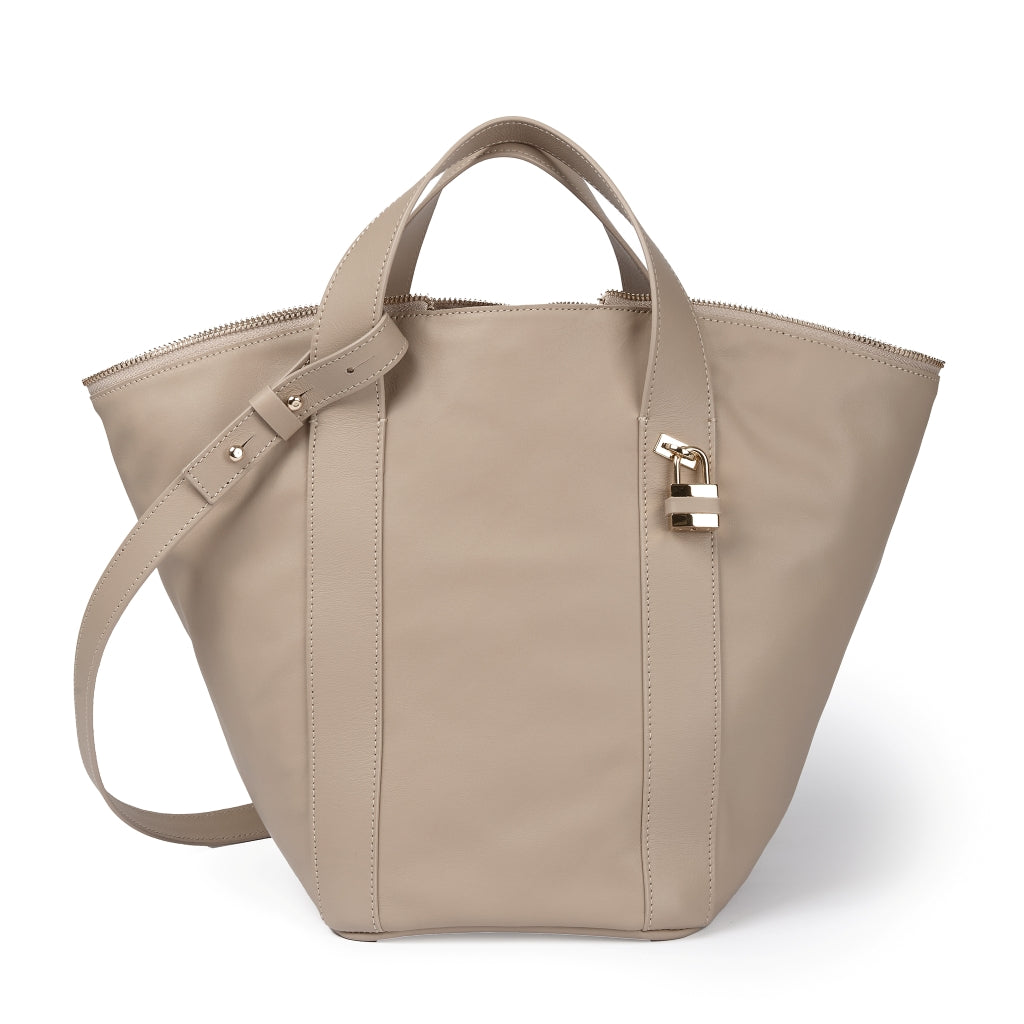 Amina small leather handbag with wrapped tubular handle and detachable shoulder strap