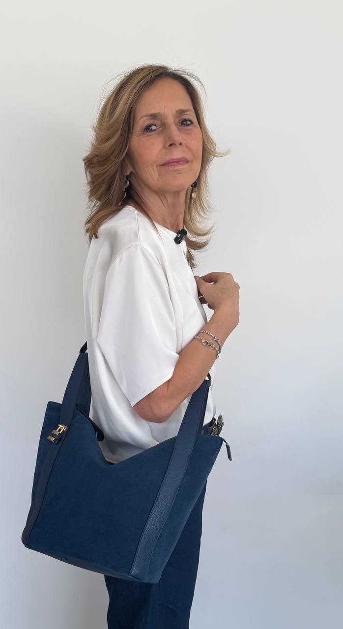 Amina small leather handbag with wrapped tubular handle and detachable shoulder strap