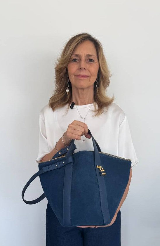 Amina small leather handbag with wrapped tubular handle and detachable shoulder strap