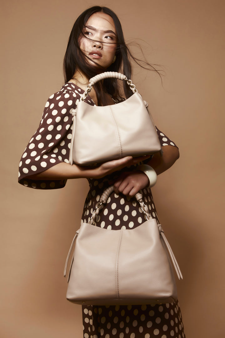Amina large leather handbag with wrapped tubular handle and detachable shoulder strap