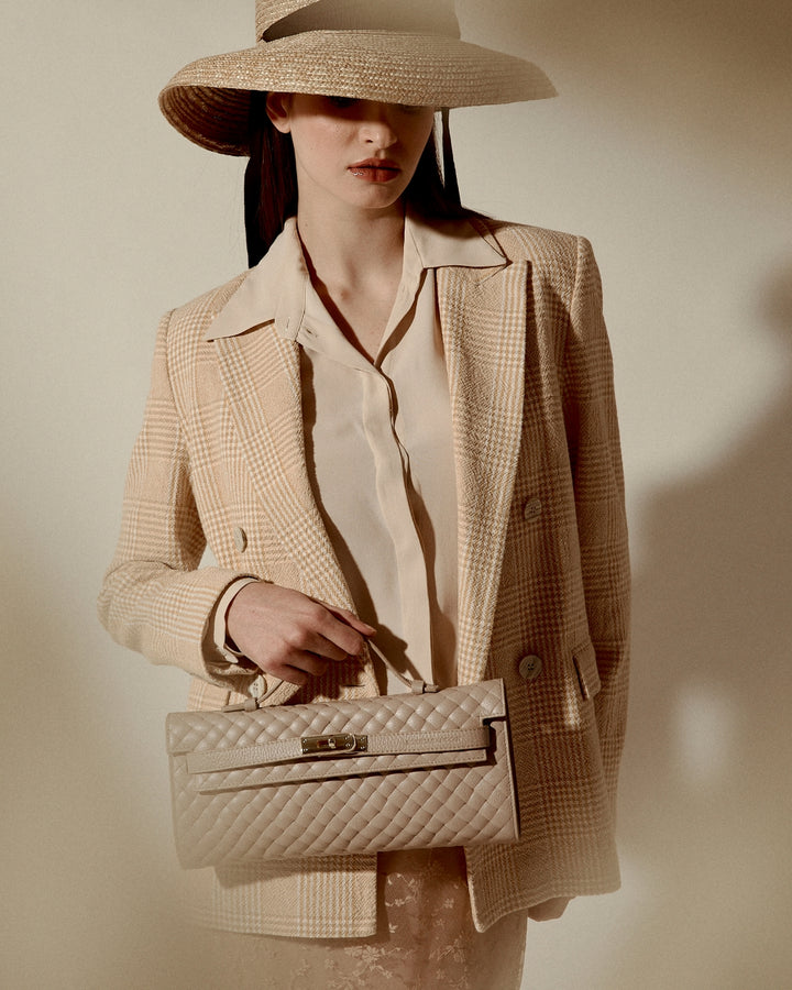 Jade Woven cluch leather bag with retractable handle closure and detachable and adjustable shoulder strap