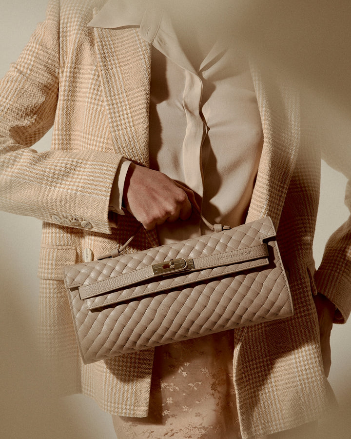 Jade Woven cluch leather bag with retractable handle closure and detachable and adjustable shoulder strap