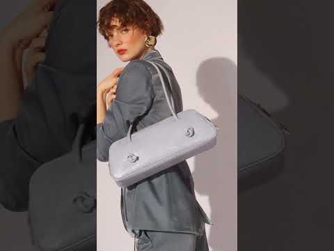 Grace Tejus – Elongated bag in glossy lizard-print calfskin