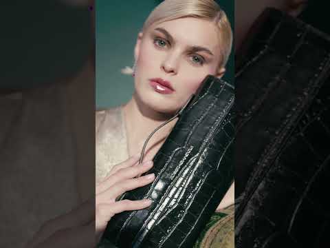 Nicole cocco clutch bag in crocodile print leather with retractable handle and detachable and adjustable shoulder strap
