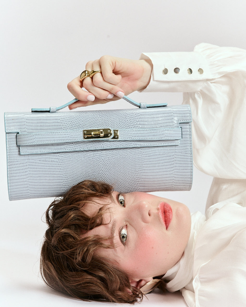 Jade Tejus cluch in pelle con chiusura  manico retrattile e tracolla staccabile e regolabile