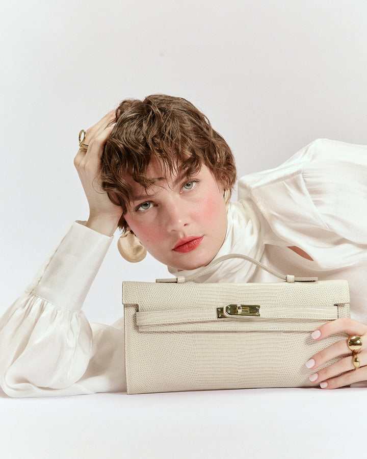 Jade Tejus cluch in pelle con chiusura  manico retrattile e tracolla staccabile e regolabile