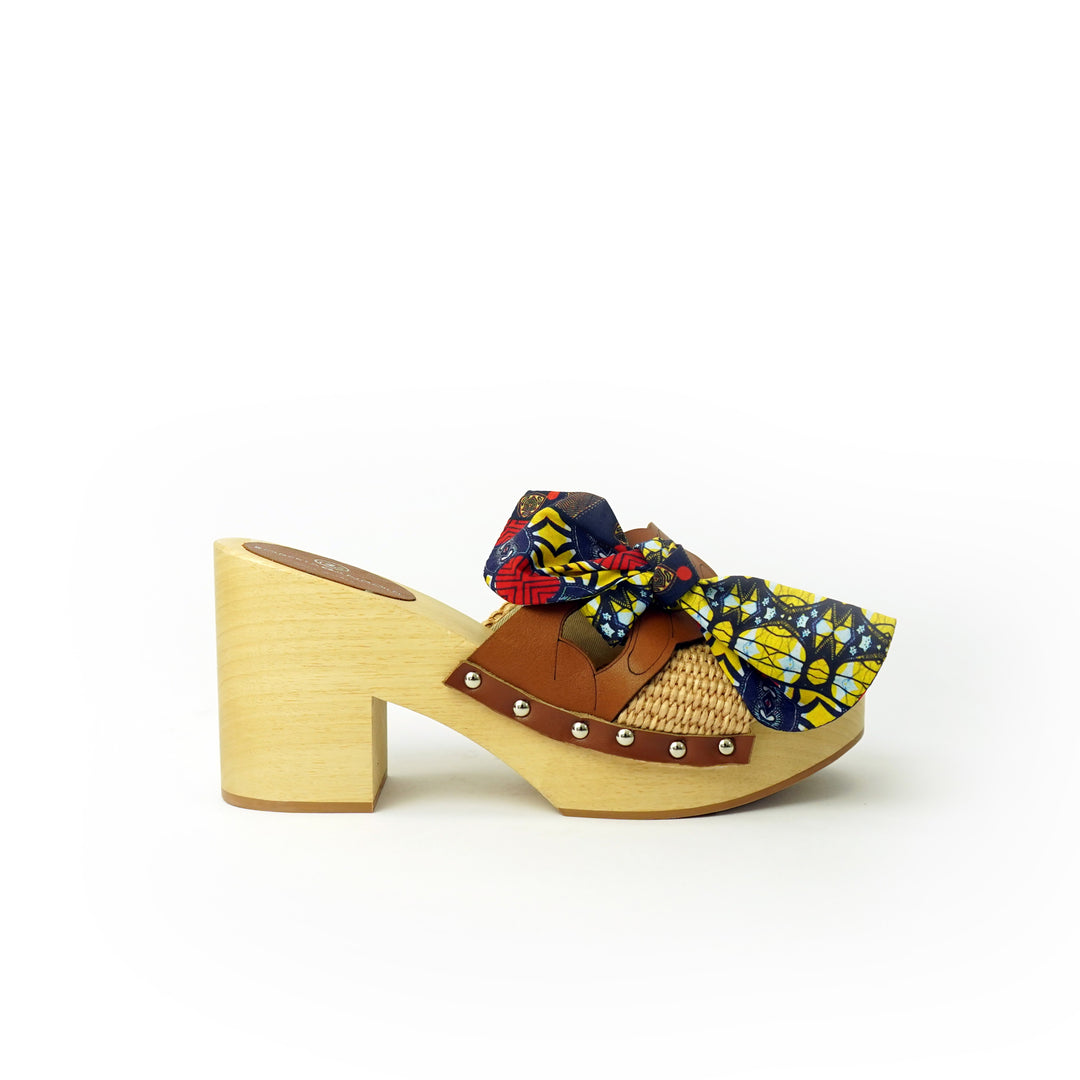 Diva Chain sandali in legno incrociato con platform in rafia e fiocco stamap african